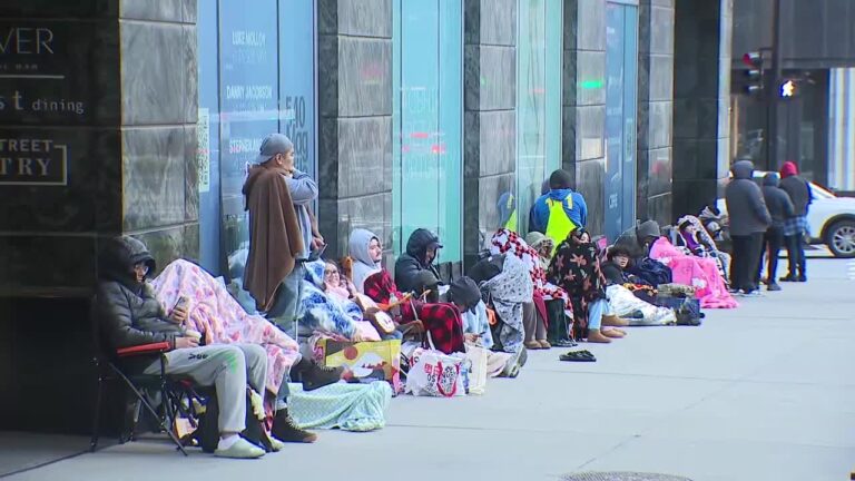 Fans line up on michigan avenue in chicago for loveable