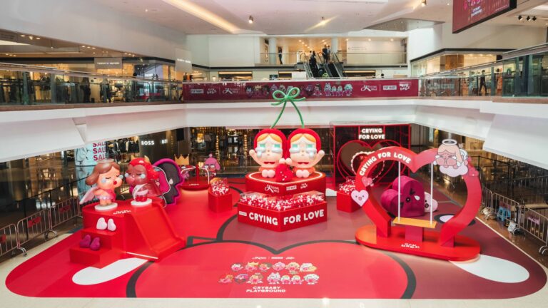 Giant crybaby installations take over festival walk, with a pop