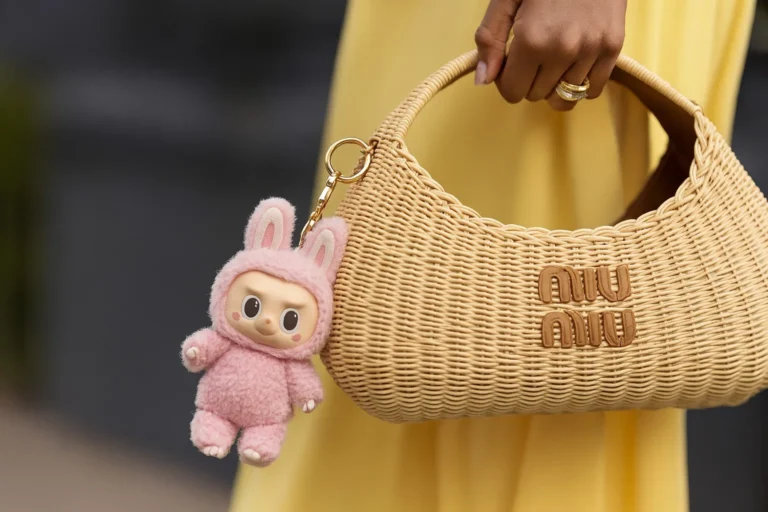 Why is everyone carrying this "monster" on their handbag? labubu