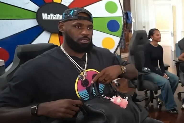 Lebron james shows off his pink labubu on his louis